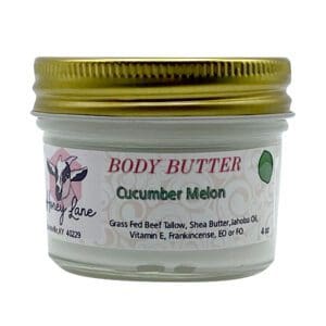 A 4oz jar of Cucumber Melon Body Butter from Honey Lane contains ingredients like grass-fed beef tallow, shea butter, and jojoba oil.
