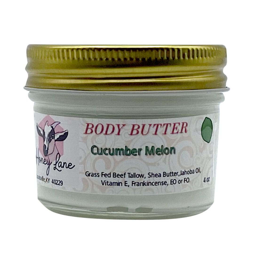 A 4oz jar of Cucumber Melon Body Butter from Honey Lane contains ingredients like grass-fed beef tallow, shea butter, and jojoba oil.