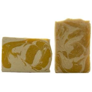 Two rectangular bars of Honeysuckle Jasmine soap with a cream and yellow marbled design; one stands upright while the other lies flat, revealing a swirled pattern.