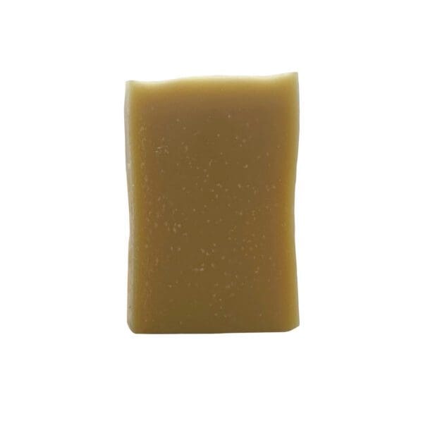A beige, rectangular Natural soap bar with a smooth surface, set against a white background.