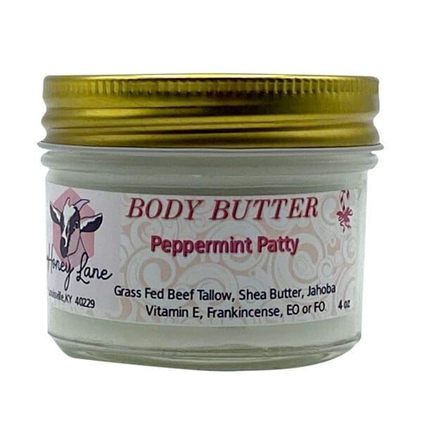 A 4 oz jar of Peppermint Patty Body Butter with a gold lid contains grass-fed beef tallow, shea butter, and jojoba.