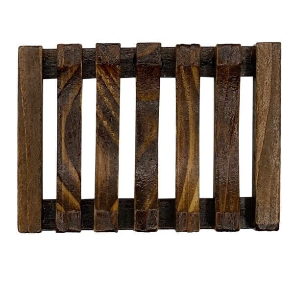 The Wooden Slat Soap Dish features a natural wood grain with six vertical slats and two horizontal supports for a compact, rustic design.