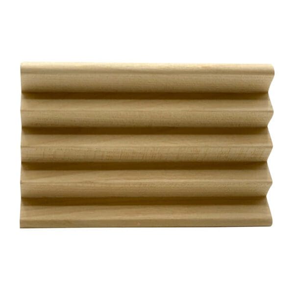 Wooden Spike Soap Dish with a grooved surface, crafted to hold soap bars and promote drainage.